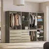 A modular closet system with various storage compartments and hanging space, organized with clothing and accessories. Produktbild-Vorschau