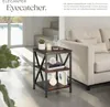 A side table with decorative items next to a sofa in a living room. Produktbild-Vorschau
