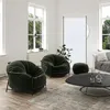 A modern living room with two green beanbag chairs, a coffee table, and a decorative screen. Podgląd zdjęcia produktu
