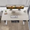 A top-down view of a standing desk with dual monitors, a keyboard, and a mouse. Voir les images du produit