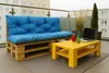 Outdoor balcony furniture set with a pallet sofa and a yellow coffee table. Produktbild-Vorschau