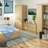 A bedroom scene with a bed, wardrobe, and dresser. Náhled obrázku produktu