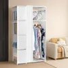 A white fabric wardrobe with hanging clothes and shelves. Produktbild-Vorschau