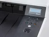 A close-up view of the control panel and paper input tray of a white and black printer. Anteprima dell’immagine prodotto