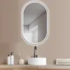 A bathroom vanity with a sink, faucet, mirror, and accessories. Produktbild-Vorschau