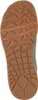 The sole of a green sneaker. Voir les images du produit