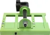 A close-up studio shot of a green metal chainsaw mill guide attachment. Náhled obrázku produktu