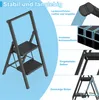 A black metal stepladder with two steps and a handrail, shown with various feature callouts and close-up views. Voir les images du produit