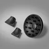 A black hair dryer diffuser and two concentrator nozzles are arranged on a gray background. Anteprima dell’immagine prodotto