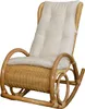 A rattan rocking chair with a cream cushion, shown against a white background. Produktbild-Vorschau