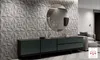 A modern living room with a textured wall, a console table, and a mirror. Produktbild-Vorschau