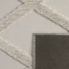 Close-up view of a rug showing its texture and backing. Anteprima dell’immagine prodotto