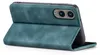 A teal flip case for a smartphone is shown from a diagonal angle, with the front cover folded open. Produktbild-Vorschau