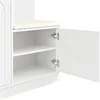Interior view of a white cabinet with open doors, showing shelves and a beige cushion on top. Podgląd zdjęcia produktu