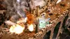 A scene from a video game showing a bridge with explosions and smoke. Produktbild-Vorschau
