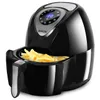 A black air fryer with a basket full of french fries, shown on a white background. Podgląd zdjęcia produktu