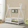 A white teepee-style children's bed with a mattress and bedding in a room with curtains and wall art. Produktbild-Vorschau
