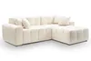 A cream-colored sectional sofa with a tufted design, shown from a side-front angle against a white background. Náhled obrázku produktu