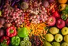 A vibrant, overhead shot of a variety of fresh fruits and vegetables, arranged in a visually appealing manner. Produktbild-Vorschau