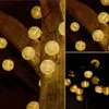 A collage of images showing string lights with paper lanterns. Produktbild-Vorschau