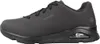 A side view of a black Skechers sneaker. Voir les images du produit
