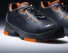 A pair of black and orange safety shoes. Náhľad obrázku produktu