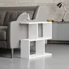 A modern living room scene with a grey sofa and a white side table. Produktbild-Vorschau