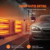 A silver car is parked in a workshop with infrared drying lamps mounted on the wall. Podgląd zdjęcia produktu