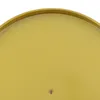 A close-up of a round, gold-colored object, likely a decorative stand or tray, with a small circular emblem visible. Podgląd zdjęcia produktu