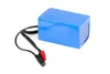 A blue battery pack with wires and connectors on a white background. Náhľad obrázku produktu