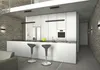 A modern kitchen with a white island, bar stools, and brick walls. Náhled obrázku produktu