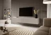 A modern living room with a TV mounted on a textured wall above a floating media console. Náhľad obrázku produktu