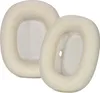 Two white ear pads for headphones are shown against a white background. Podgląd zdjęcia produktu