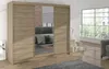 A bedroom scene with a large wooden wardrobe with mirrored doors, a sofa and a window with trees outside. Náhľad obrázku produktu