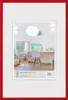 A framed picture of a modern home office setup. Produktbild-Vorschau