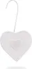 A white heart-shaped ornament with a smaller heart in the center, hanging from a silver hook. Voir les images du produit