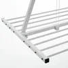 A close-up view of a white drying rack, focusing on the frame and some of the hanging lines. Podgląd zdjęcia produktu