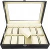 An open black watch organizer with cream interior and 12 watch slots, one of which has a cream cushion. Produktbild-Vorschau