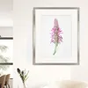 A framed picture of a flower hanging on a wall in a room. Anteprima dell’immagine prodotto