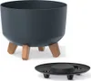 A dark gray planter pot with brown legs and a black saucer are shown against a white background. Náhled obrázku produktu