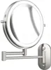 A silver LED makeup mirror mounted on a wall with a double arm. Produktbild-Vorschau