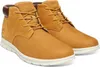 A pair of tan Timberland chukka boots with white soles, shown from a slightly elevated side angle against a white background. Produktbild-Vorschau