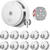 A collection of wireless smoke detectors and their mounting hardware are displayed against a white background. Produktbild-Vorschau