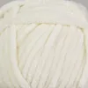 A close-up view of a ball of soft, fluffy yarn. Náhľad obrázku produktu