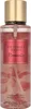 A bottle of Victoria's Secret Romantic fragrance mist for women. Produktbild-Vorschau