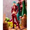 A figurine of Ban from The Seven Deadly Sins is displayed in a still life setting with fruits and bottles. Produktbild-Vorschau