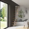 A modern living room with a space-saving staircase, large window, and decorative plant. Produktbild-Vorschau