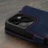 A close-up view of the camera lenses of an iPhone 15 Pro, partially covered by a dark blue leather wallet case with red stitching. Produktbild-Vorschau