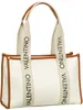 A white Valentino tote bag with brown trim and straps is shown against a white background. Anteprima dell’immagine prodotto