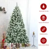 A flocked artificial Christmas tree is shown in a room with decorative elements. To the right, there are four circular icons with text descriptions highlighting product features. Produktbild-Vorschau